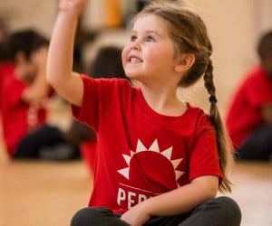 7 year olds benefit from singing classes to help their communications skills. 